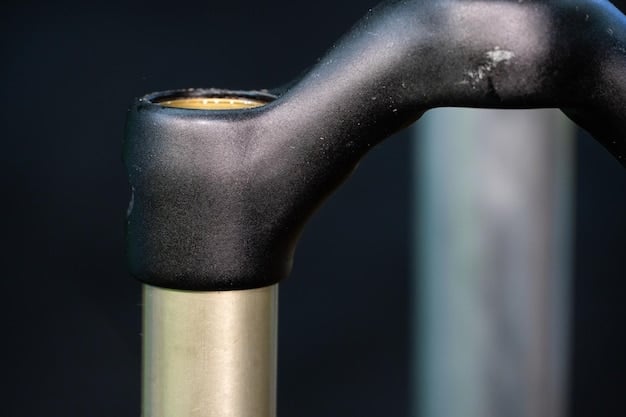 A close-up photograph focusing on a compression fitting connecting tubing to a water block. The image highlights the importance of proper sealing and tightening to prevent potential leaks in a liquid cooling system.