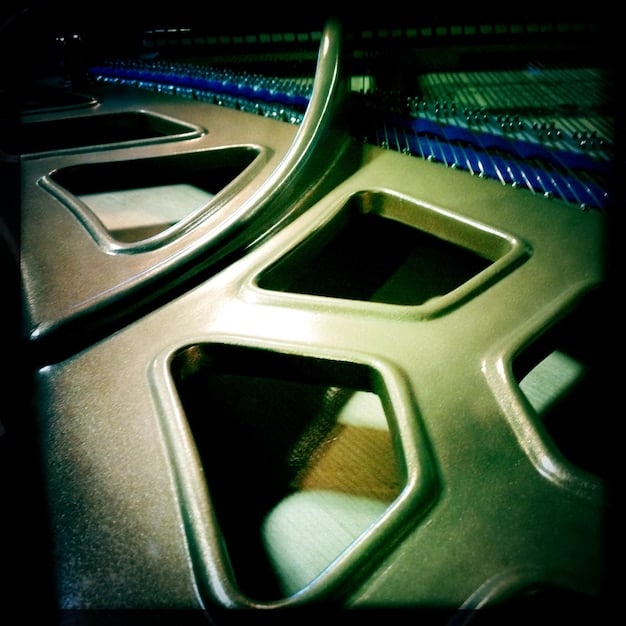 A detailed close-up of a high-end NVIDIA RTX 4000 series graphics card, highlighting its intricate design and cooling system, with the focus on the GPU die and memory chips.