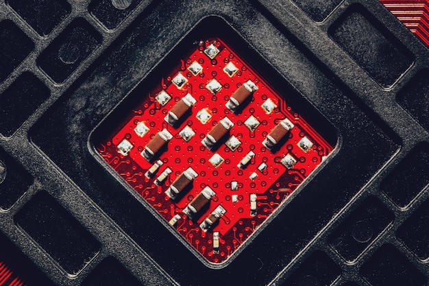 A detailed image showcasing the back of two AMD Radeon GPUs connected with a CrossFire bridge. The focus is on the bridge and the connection ports, emphasizing the hardware aspect of setting up CrossFireX.