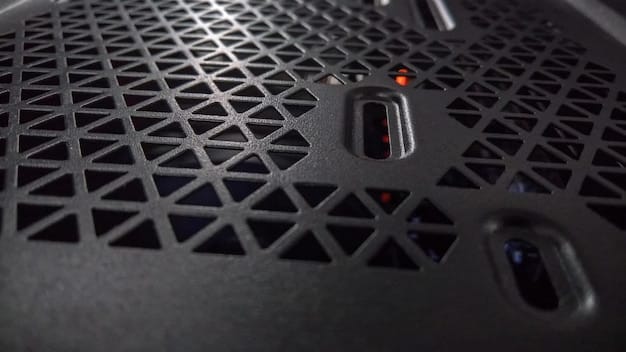 A close-up shot of a PC case interior with sound dampening material attached to the side panel. The focus is on the texture and thickness of the dampening material, highlighting its sound-absorbing properties.