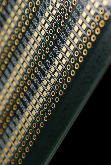 A close-up shot of a motherboard's CPU socket, highlighting the intricate pin layout and the mounting mechanism for CPU coolers.