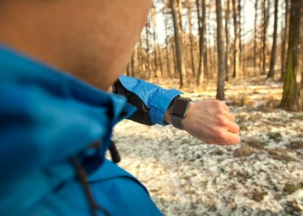 A close-up shot of a Garmin Fenix smartwatch on a trail runner's wrist, displaying intricate GPS data and heart rate zones, with a scenic mountain backdrop at sunrise.